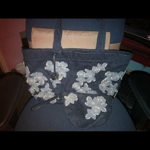 Beautiful Michael Kors Denim Tote Bag w/floral applique & matching wallet.